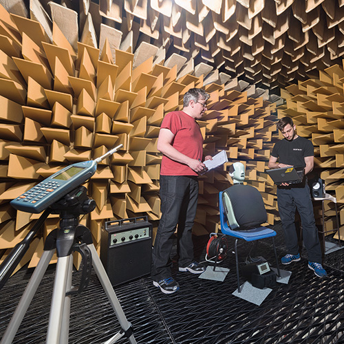 People conducting tests in anechoic chamber.
